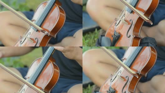一位艺术家正在拉小提琴高清在线视频素材下载