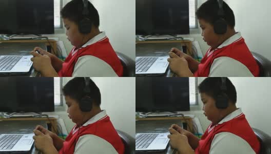 亚洲男孩玩手机游戏格式VDO高清。高清在线视频素材下载