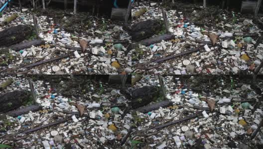 泰国沙慕普拉坎红树林的岸上垃圾。高清在线视频素材下载