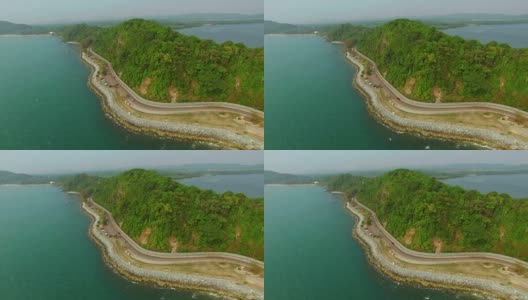 “Noen Nangphaya”视点，在靠近海边的Chanthaburi的蜿蜒道路区域的日落，鸟瞰图高清在线视频素材下载