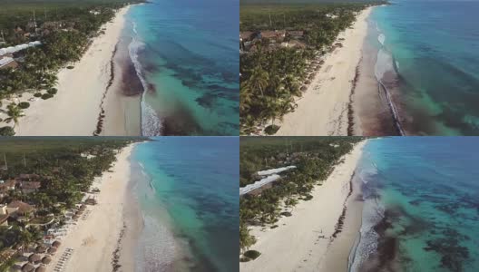 在加勒比海清澈的海水沙滩上爆发的波浪。高清在线视频素材下载
