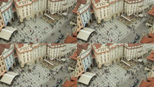 随着空中时间的流逝，红色瓷砖下的童话般的房子出现在老城区广场上高清在线视频素材下载