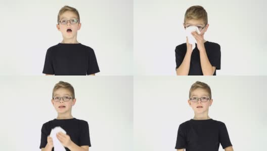 戴眼镜的小男孩打了个喷嚏高清在线视频素材下载