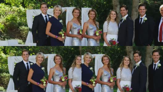 快乐的年轻新娘和新郎与家人和朋友拍照4K 4K高清在线视频素材下载