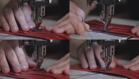 近距离拍摄的主人的手，谁使用缝纫机创造针在一个皮革钱包，针慢慢穿透材料高清在线视频素材下载
