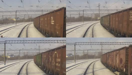 4K的视角从火车火车头。火车一路驶过火车站高清在线视频素材下载