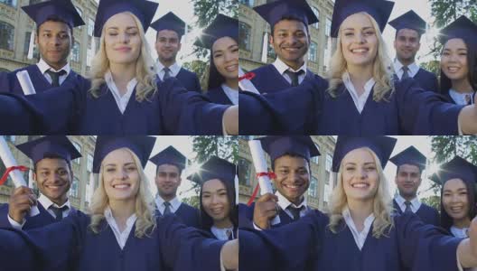 同学们戴着学术绶带自拍毕业典礼，成就一番事业高清在线视频素材下载