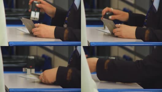 机场工作人员对登机旅客进行护照检查高清在线视频素材下载