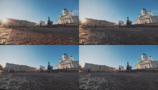 时间流逝:游客聚集在赫尔辛基参议院广场，广场上有亚历山大二世的雕像高清在线视频素材下载