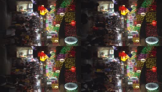 新加坡唐人街农历新年期间垂直拥挤的小巷高清在线视频素材下载