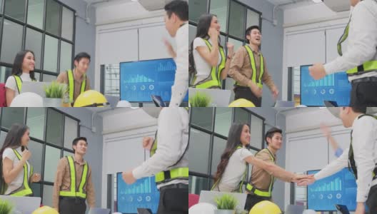 一群年轻的商业人士在办公室讨论会议后握手。男人和女人有交流头脑风暴和共同工作的项目作为团队。高清在线视频素材下载