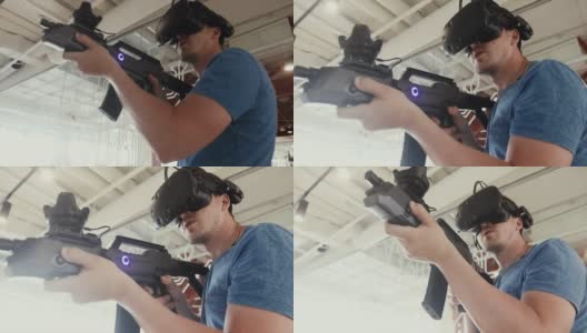有人拿着枪戴着眼镜玩VR狙击游戏高清在线视频素材下载