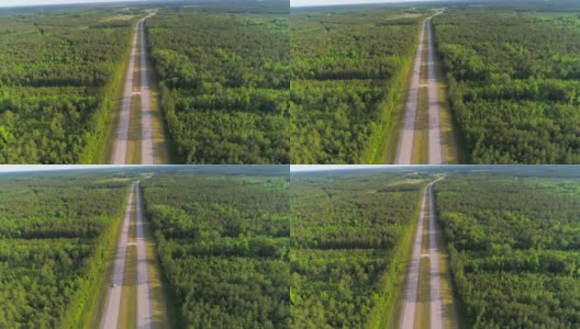 美国北卡罗来纳州，森林环绕的高速公路上交通缓慢。鸟瞰图。高清在线视频素材下载