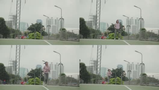 亚洲女人跑。人们早上慢跑锻炼高清在线视频素材下载