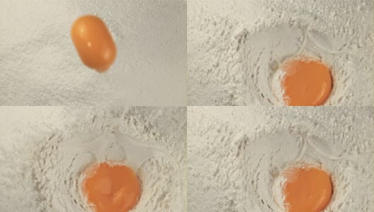 超级慢动作在一堆面粉中落下一个新鲜的鸡蛋。在高速相机拍摄1000帧每秒。高清在线视频素材下载