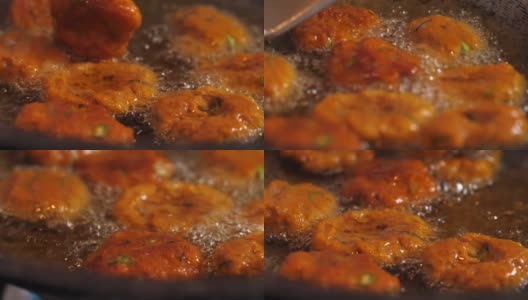 炸鱼丸或油炸鱼饼，制作炸鱼丸高清在线视频素材下载