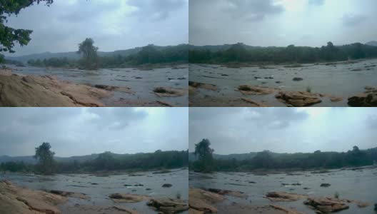 清晨从平角流下的山间河流在森林中流淌高清在线视频素材下载