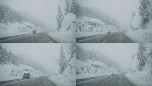 在高速公路上行驶的汽车挡风玻璃上飘落的雪高清在线视频素材下载