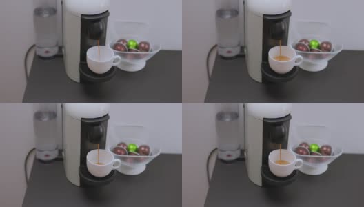 从胶囊咖啡机倒咖啡的特写镜头。瑞典。高清在线视频素材下载