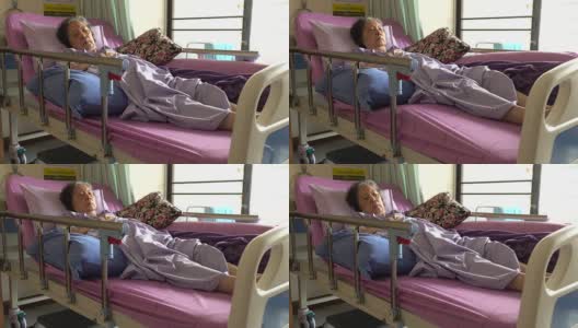 年老的女病人躺在医院的病床上高清在线视频素材下载