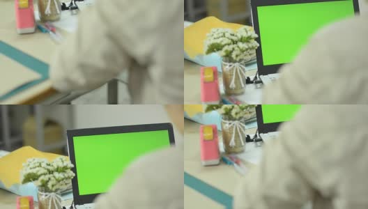 Over Shoulder shot平移:艺术家正在笔记本电脑上工作高清在线视频素材下载