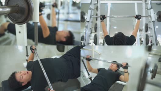 四拍年轻的亚洲男子锻炼胸部肌肉高清在线视频素材下载