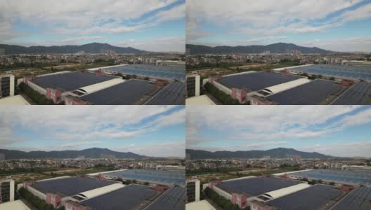 工业区域厂房屋顶太阳能发电厂的高视角视图高清在线视频素材下载