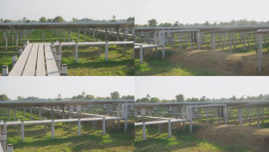 太阳能电池板农场，生产清洁电力，从地面下看阳光高清在线视频素材下载