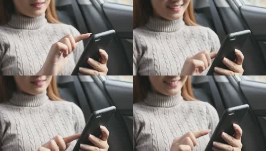 近距离观察亚洲女性在车里使用平板智能手机高清在线视频素材下载