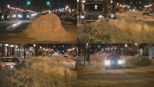 暴风雪。冬季交通。汽车在滑溜溜的路上行驶。下雪,雪花。高清在线视频素材下载