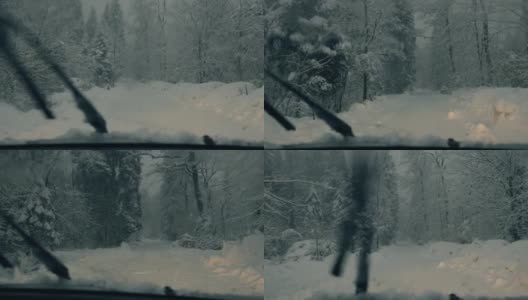 汽车在大雪中行驶高清在线视频素材下载