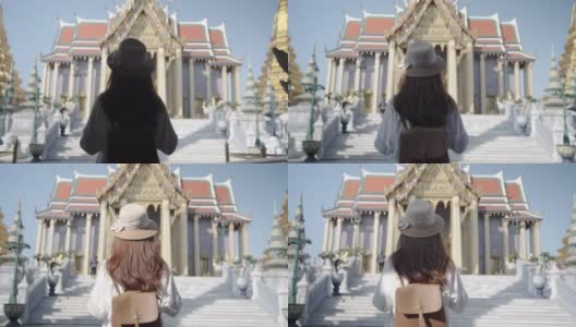 在泰国曼谷的佛教寺庙Wat phra keaw的亚洲女性游客。它是曼谷最美丽的寺庙之一高清在线视频素材下载