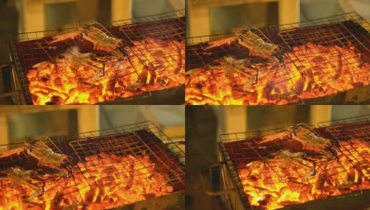 平底锅:晚上烧烤时用的烤蟹高清在线视频素材下载