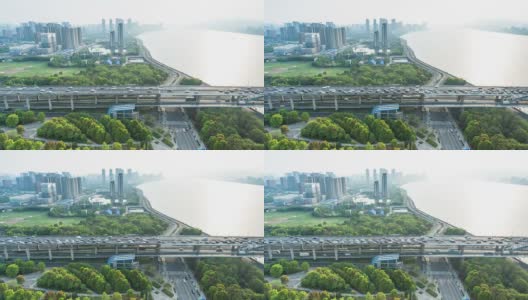 时间流逝，杭州高架路上的天际线和繁忙的交通。高清在线视频素材下载