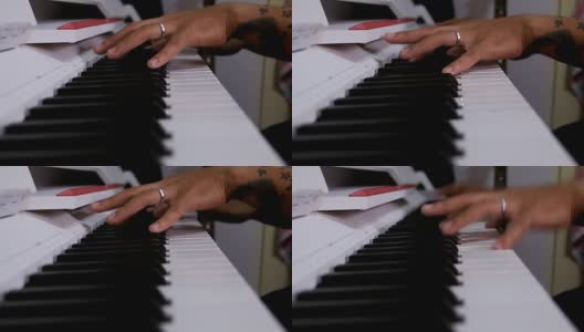 男子手在键盘上弹奏钢琴高清在线视频素材下载