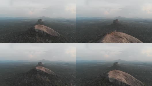 鸟瞰图向后飞行的皮杜兰加拉和西格里亚岩，一个必须看到在斯里兰卡。4 k。高清在线视频素材下载