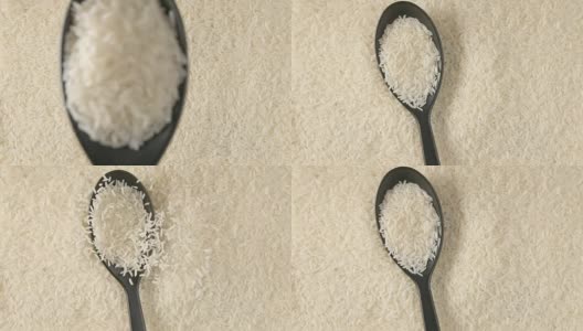 俯视图:勺子上的米饭落在米饭上(慢镜头)高清在线视频素材下载