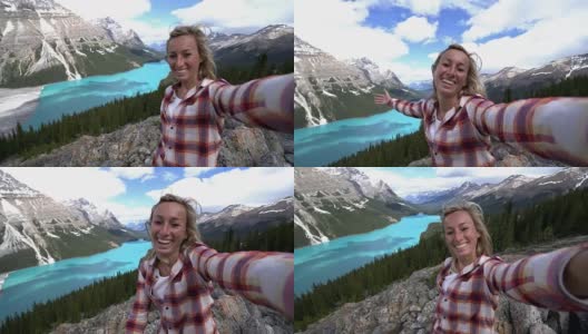 一名年轻女子在加拿大班夫国家公园旅游时的自拍高清在线视频素材下载