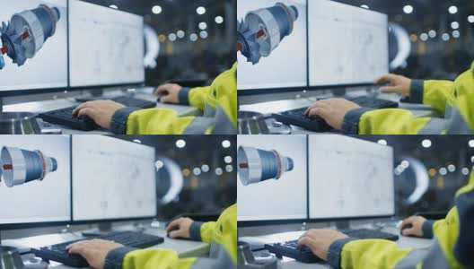 在重工业工厂里面，工业工程师的手在个人电脑上工作的特写镜头设计涡轮/发动机在3D，使用CAD程序。高清在线视频素材下载