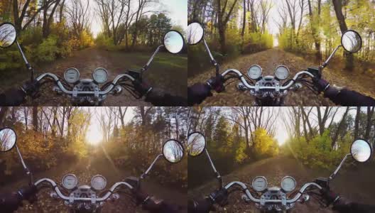 4 k编译视频。神奇的摩托车骑向金色的日落在神奇的森林道路上，宽阔的视角的骑手。永远经典的巡洋舰/直升机!高清在线视频素材下载