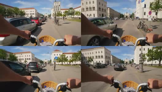在慕尼黑路德维希大街上，一名男子骑着折叠自行车高清在线视频素材下载