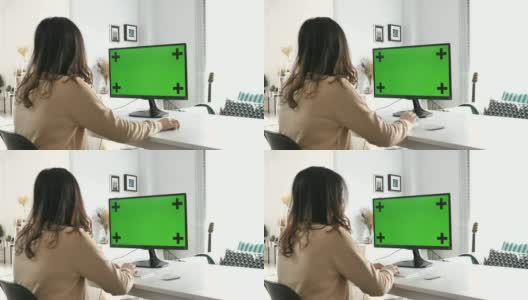 女人在用电脑绿屏高清在线视频素材下载