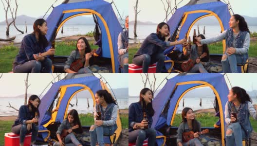特写镜头:三个女人花周末时间在海边露营日落高清在线视频素材下载