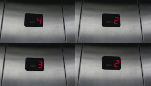 电梯内展示从4楼到1楼的楼层。高清在线视频素材下载