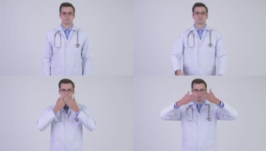 年轻英俊的男医生戴着眼镜高清在线视频素材下载