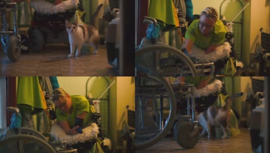 残疾妇女正在准备从轮椅到另一把椅子的经历。高清在线视频素材下载
