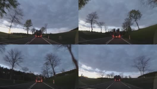 行车记录仪在日落后面的卡车POV，波兰欧洲高清在线视频素材下载