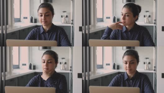 一个印度女人用笔记本电脑思考问题解决问题高清在线视频素材下载