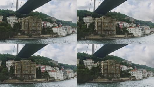 波夫巡游在Fatih Sultan Mehmet Bridge下，第二座有住宅建筑的桥高清在线视频素材下载