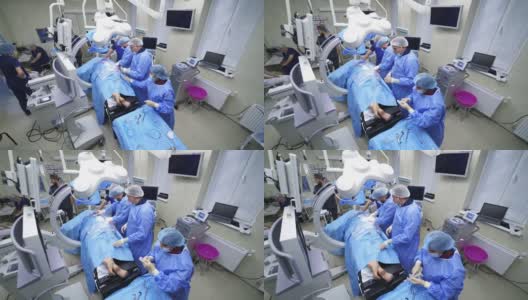 穿着手术服的外科团队正在为病人做手术高清在线视频素材下载
